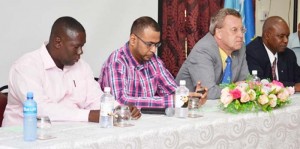 (From left) Manager of the Forestry Training Center Inc. Quacy Bremner, Minister Robert Persaud, EU Ambassador to Guyana Robert Kopecký, and FAO representative in Guyana Reuben Robertson 