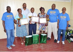  Retired Teachers honoured with officials of the Rose Hall Town Youth and Sports Club.