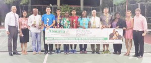 The respective winners and runners up along with officials of the GTA and Sponsors Assuira Insurance take a photo op following the presentation. 