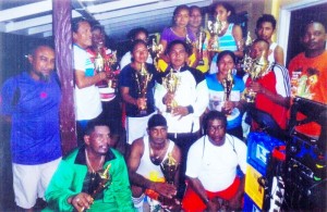 The athletes display their prizes with officials of the club and sponsors. Region nine DREO Mohamed Arjune is at left.