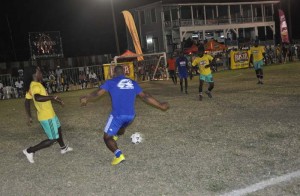 Sparta Boss (blue jerseys) on the attack in their clash against Kitty Weavers. 