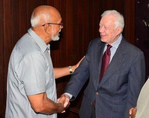 President Donald Ramotar, greeting former US President Jimmy Carter 