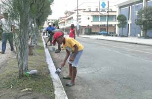 Young children were among the team members in yesterday’s cleanup exercise on Water Street