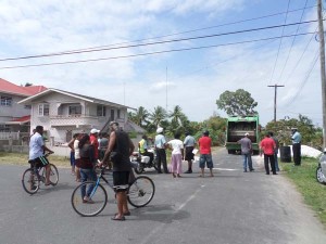 The crowd that gathered at the scene yesterday.