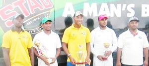 The captains of the top three clubs pose with Mark Papannah and Delbert Hicks of the RHTYSC. 