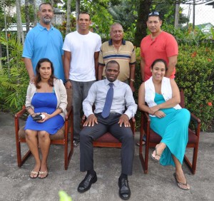 New GCF President Horace Burrowes (seated) is flanked by Secretary Ms. Maria Leung (right) and Treasurer, Ms. Rosanna Sookoo. Standing from right are, Jerome Allicoco (3rd VP), Hassan Mohamed (Race Secretary), Paul Choo-wee-nam (1st VP) and Andrew Arjoon (2nd VP).   