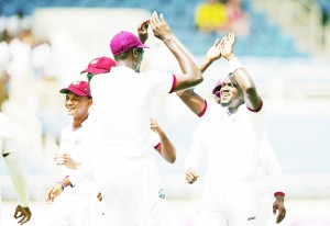  Jerome Taylor of West Indies celebrates after taking the wicket of David Warner of Australia during day one of the Second Test match between Australia and the West Indies at Sabina Park on June 11, 2015 in Kingston, Jamaica.  (Photo by Ryan Pierse/Getty Images)