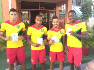 (L-R) Matthew Briggs, Neil Danns, Sam Cox and Marcel Barrington proudly displaying their Guyanese Passport. 