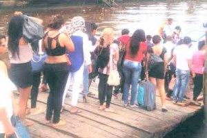 The women as they were about to board the boat for Georgetown