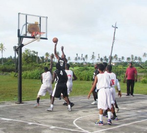 Action in the game between the winning East Canje Knights in White and the Fyrish Black Sharks. 