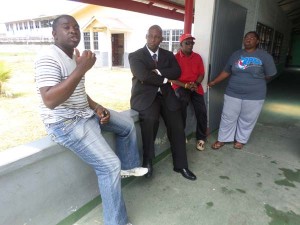 Attorney at Law, Leslie Sobers (second from left), interacts with members of the Blind Society.