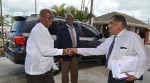 Minister of Finance Winston Jordan being greeted at the Guyana Revenue Authority by Commissioner General Khurshid Sattaur during his tour of the agency’s Head Office on Camp St, Georgetown.