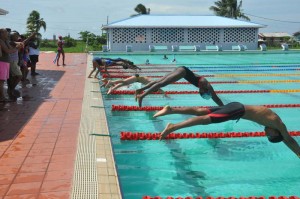 Athletes take to the pool in one of the races. 