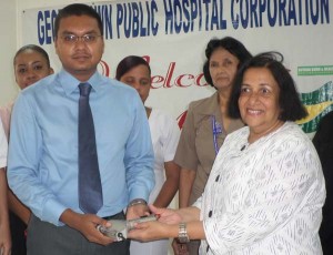 Mrs Pamela Harakh hands over the dermatome to Dr Shilindra Rajkumar yesterday.