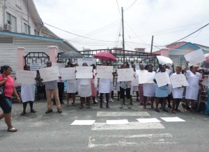 GPHC nurses in protesting the dismissal of Director, Nursing Service, Ms. Colleen Hicks.