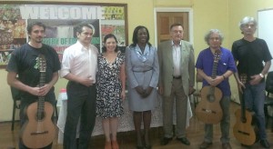 Minister within the Ministry of Education, Nicolette Henry, flanked by Argentine Ambassador Alberto Martino (to her immediate left) and performers from the Argentine Cultural Troupe.