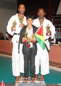 Members of the victorious ‘Team Alleyne’, Rodwell Alleyne (left), Kwesi Patrick (right) and Joseph Rahaman. 