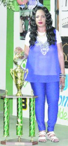 Faye Joseph displays the winning trophy. 