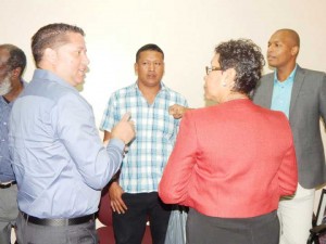 GFF ministry-: GFF Technical Director Claude Bolton (L) and Minister within the Ministry of the Indigenous People’s Affairs Valerie Garrido-Lowe, along with GFF NC Chairman sharing a light moment after their July 1 meeting.