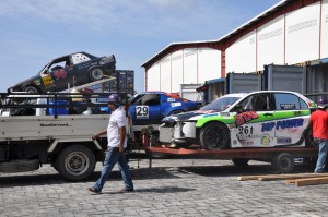  Workers from John Fernandes Ltd Container location assisting in the  destuffing of the Guyanese drivers’ cars from the Containers yesterday.