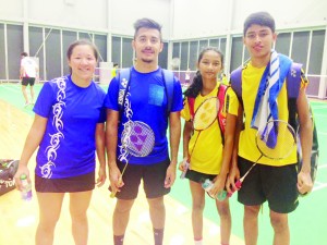 Narayan and Priyanna Ramdhani (right) pose with the  Chilean pair that defeated them in the Mix Doubles game. 