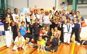 Members of the victorious Guyana Black Hawk’s Martial Arts Academy with their accolades. 