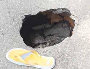 The growing sinkhole on the UG road