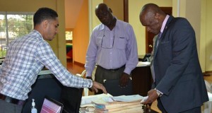 Minister of State, Joseph Harmon in the OLPF Office