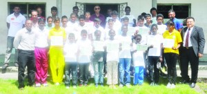  Participants and officials at the closing  of the ECCB Academy yesterday, ECCB  President Bissoondyal Singh is at right.