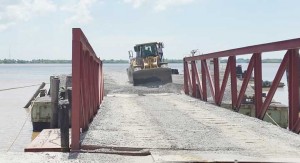 The BaiShanLin barge being offloaded at Providence on Friday.