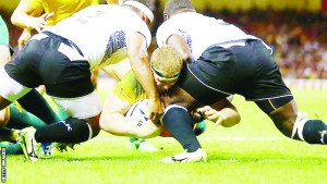 Australia on attack during their match with Fiji. (Getty Images)