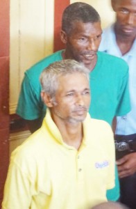 Rafeek (yellow shirt) and Terry Roberts