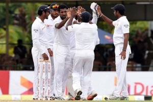 Dhammika Prasad bowled with typical zest and purpose on the second day © AFP 