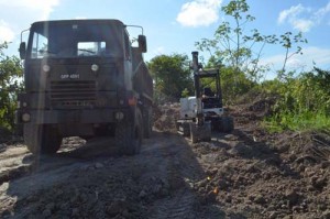 Two of the seized trucks.