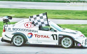 Trinidad and Tobago’s Kristian Boodoosigh displays the chequered flag following one of his victories in this year’s CMRC.