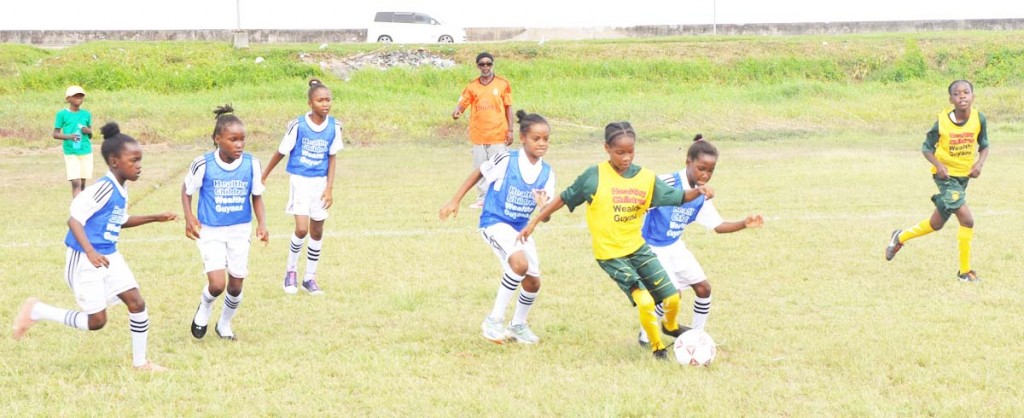 Action in this year’s Smalta / Ministry of Public Health Girls Pee Wee Football Tournament.