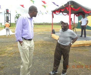 Minister David Patterson speaking with one of the Timehri, North residents.