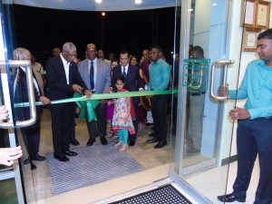 The ribbon cutting to usher in the new bank 