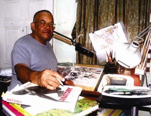 Writer and illustrator Barrington Braithwaite in his studio