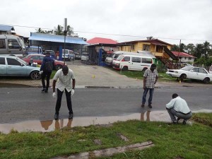 Crime Scene Investigators searching for warheads following the shooting.