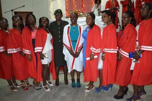 Minister Henry and graduates from the Guyana Defence Force.