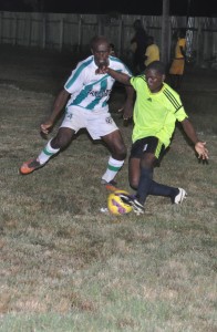 Grove Hi Tech’s Alex Sinclair (r) and Victoria Kings Shawn Samuels involved in fierce rivalry before the latter was red carded.