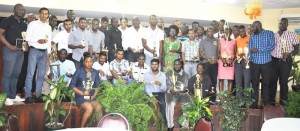 Recipients of medals and trophies for outstanding performances during the calendar year 2014-15 of the University of Guyana pose with their hardware for a photo op following the completion of the awards ceremony last Friday.