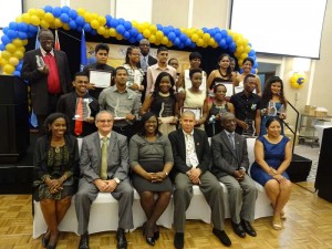 (from right) Dr. Paloma Mohammed, PAHO/WHO country representative Dr.William Ado Krow, and Public Health Minister George Norton on Friday night with participants and winners of the 2015 PAHO Clare Forrester Media Awards for excellence in Health Journalism. 