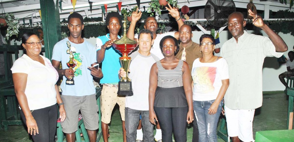 Members of the victorious Scramblers team with Oshantti Joseph (fourth from right) and GDA secretary Barbara Marshall left.