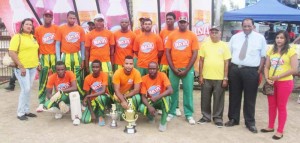 2015 BUSTA Champion of Champions winners Rose Hall Town Gizmos & Gadgets pose with Guyana Beverag Inc. CEO Robert Selman (2nd right) and Marketing Manager Shameeza Yadram, left.