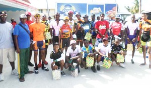 The top performers of the Benjamin Bakery of Buxton 40-mile cycle race pose for a group photo following the presentation. 