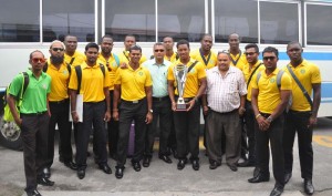 PCL Champions Guyana Jaguars! Skipper Leon Johnson flanked by GCB President Drubahadur (right) and Secretary Anand Sansei shortly after the team returned.