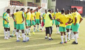 GFF Head Coach Jamaal Shabazz has the full attention of his Golden Jaguars at the Guyana National Stadium during training in March 2015.