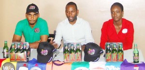 (From left)- Ansa Mcal /Stag Beer Representative Linden Henry, Hikers Club President Devin Munroe and executive member Kenisha Wills at yesterday’s Launch.